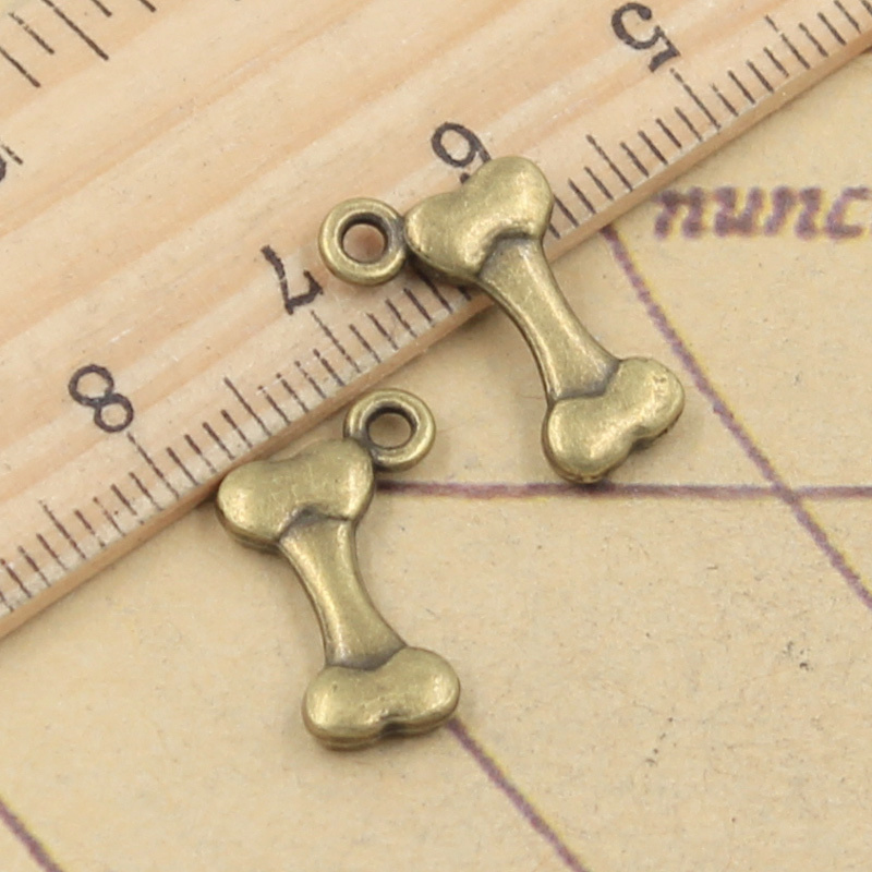 40pcs Charms Dog Bone 16x10mm  - Vintage Fashion Finds recension och pris